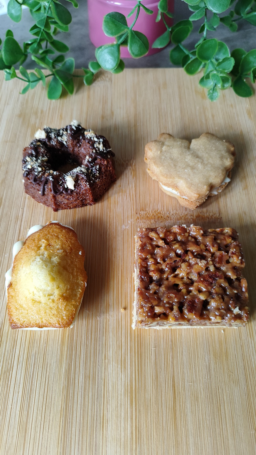 A curated box of handmade pastries including a toffee bar, madeleine, financier and signature cookie. Baked with love, shipped with care.