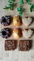 A generous pastry box with two of each handmade treat. Perfect for sharing, gifting, or indulging together.